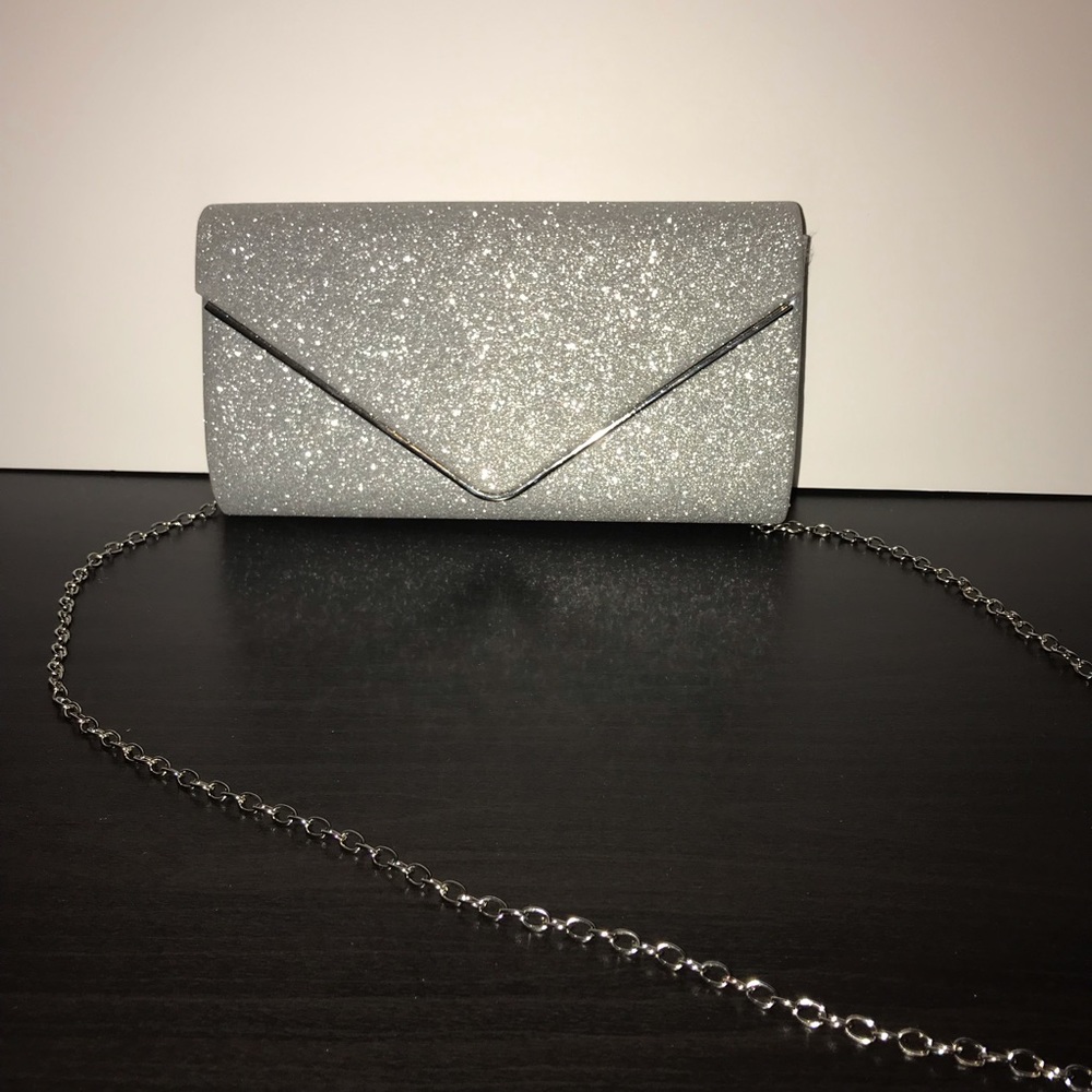 Glistening silver clutch